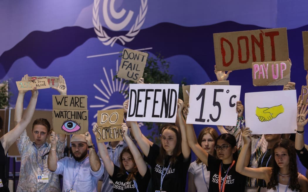 COP28 The Bonn climate change conference is witnessing several protests against non-action by rich countries. Protesting climate activists Photo: AFP / Mohamed Abdel Hamid / Anadolu Agency